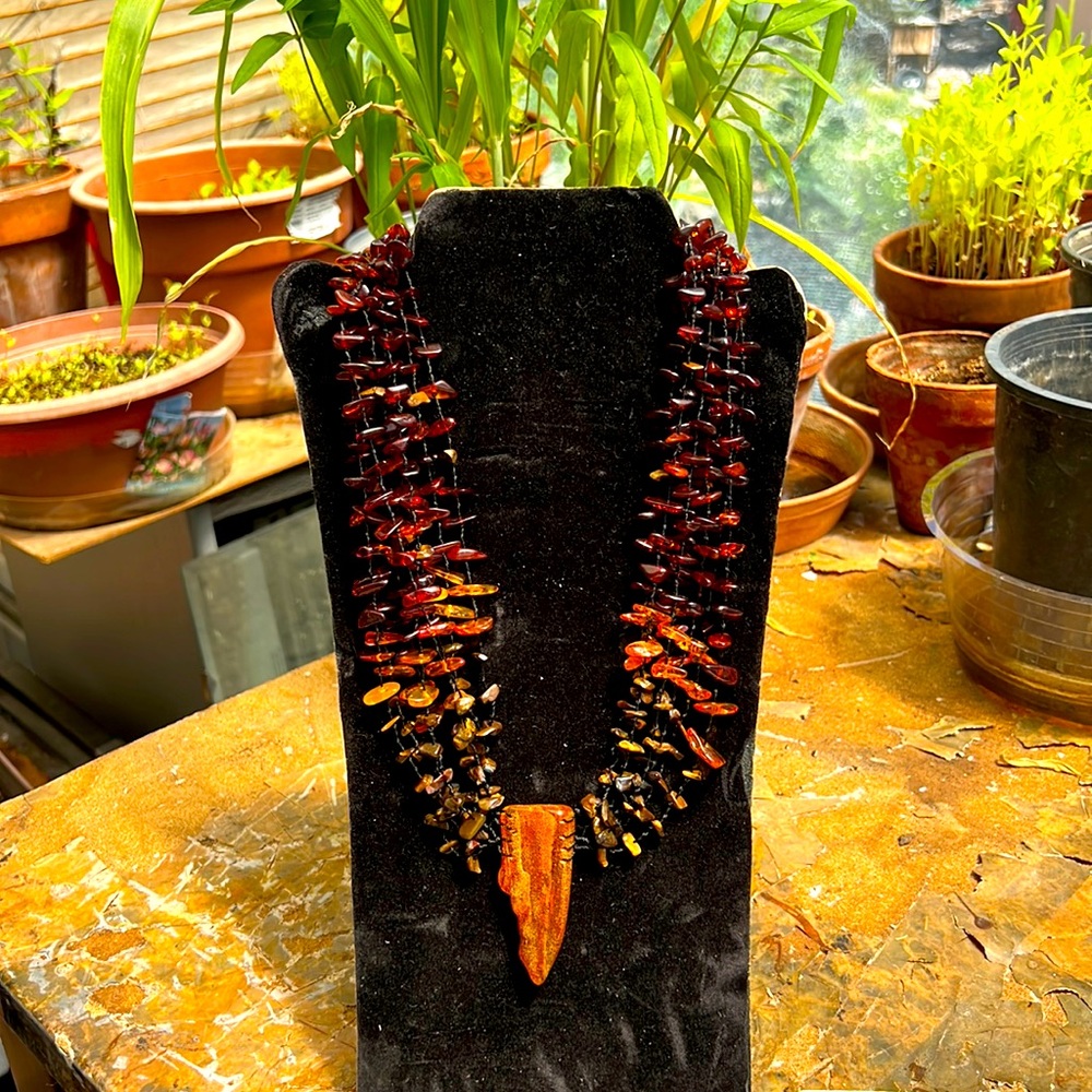 Amber multi strands with large pendant